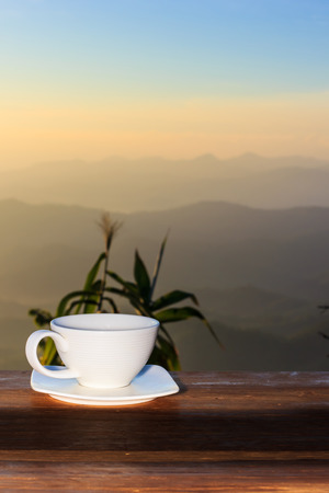 cup of morning coffee on natural outside background.の写真素材