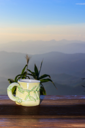 cup of morning coffee on natural outside background.の写真素材