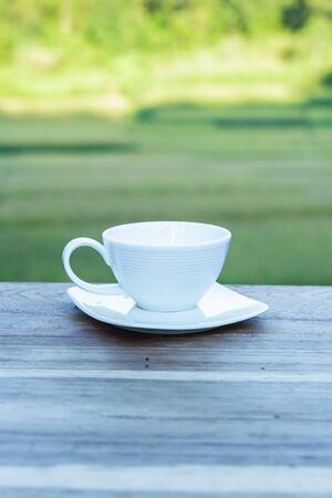 cup of morning coffee on natural outside background.の写真素材