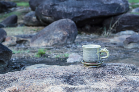 cup of morning coffee on natural outside background.の写真素材