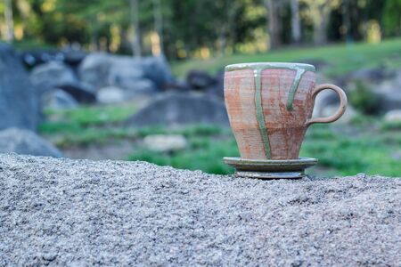 cup of morning coffee on natural outside background.の写真素材