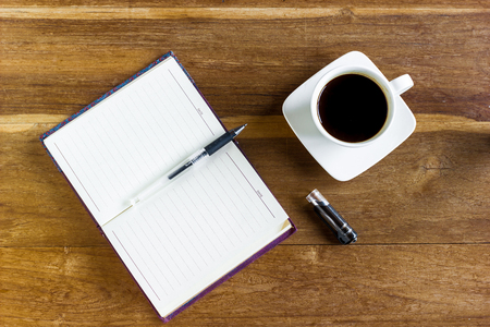 coffee and notepad, workplace businessmanの写真素材