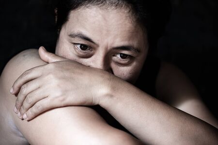 Fear, loneliness, depression, abuse, addiction  concept about violence against women