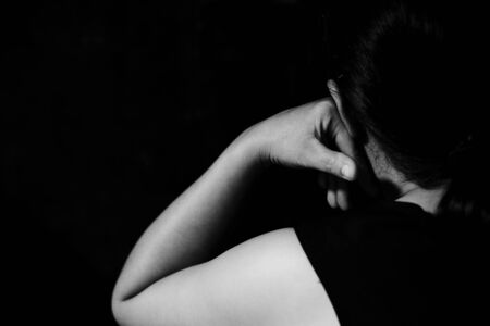 Fear, loneliness, depression, abuse, addiction  concept about violence against womenの写真素材