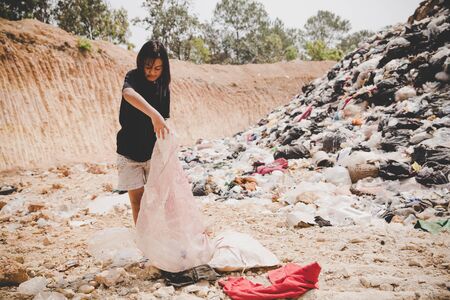 Poor children collect garbage for sale, the concept of pollution and the environment, Recycling old...