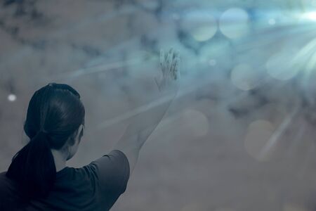 Christian worship God in Church hall and light bokeh effected. Raised hand and praise the LORD.