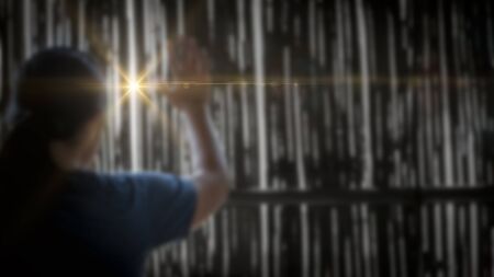 Blurred photo of Girl praying and worship to GOD. Female pray to GOD. Hand praying and palm up, Concept Praise and worship with faith.の写真素材