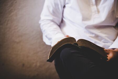 Woman christian read bible, Asian girl who believers praying and worshiping to god, Concept of learning Bible.の写真素材