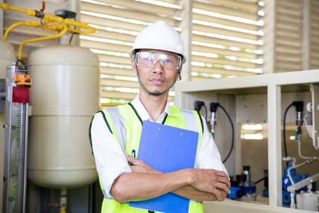 Handsome electrical engineer. Successful, Handsome Man in Modern Industrial Environment.