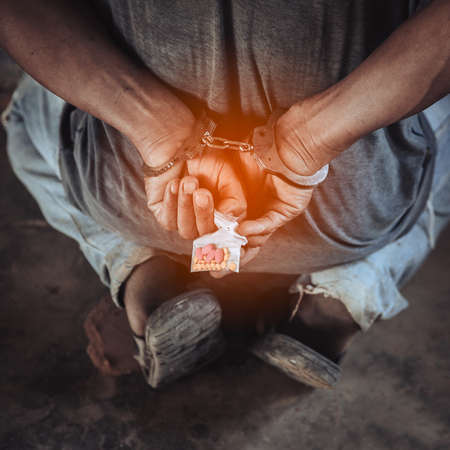 Police officer finds drugs during the search, drug addict was arrested.の写真素材