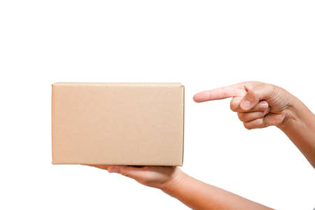 A parcel cardboard parcel box in a delivery woman person hands isolated on white background....