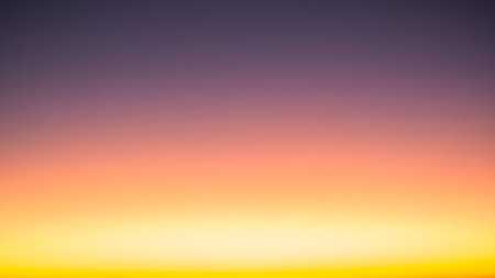 Beautiful bright cloud sky with light for heaven religion background. Sunrise and twilight or sunset cloudscape is orange and blue colours in summer nature.の写真素材