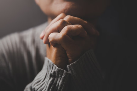 Christ religion and christianity worship or pray concept. Christian catholic woman are praying to...