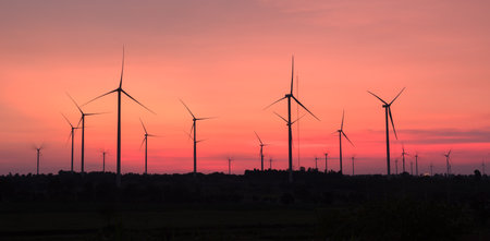 Concept of renewable energy sources, green energy. Innovative wind turbine Sustainable source of electricity is conservation of global environment. Wind energy technology to conserve ecosystems.の写真素材