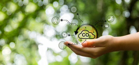 Footprint with Reduce CO2 emission concept. Sustainable development and green business based on renewable energy. Renewable energy-based green businesses can limit climate change and global warming.の写真素材