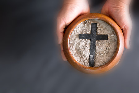 Ashes in hand are prepared for Christian festival of apostles. dust symbol of religion, sacrifice, redemption, Jesus Christ, ash wednesday, lent, Good Friday, Easter with Church is devoted to fastingの写真素材