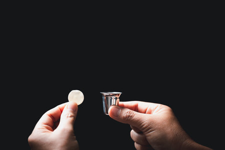 Concept of Eucharist or holy communion of Christianity. Eucharist is sacrament instituted by Jesus. during last supper with disciples. Bread and wine is body and blood of Jesus Christ of Christians.の写真素材