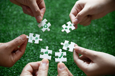 Companies are targeting net zero greenhouse gas emissions. Carbon credit concept.Tradable certificate to drive industry in direction of low emissions in efficiency cost. Jigsaw puzzle with decrease CO2の写真素材