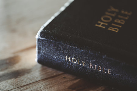 Holy bible book for education on wooden table with background. Christian catholic with protestant...