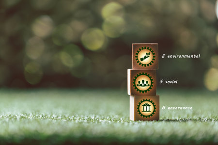 ESG concept of environmental, social and governance. words ESG on a wood cube is idea for business sustainable organizational development. âaccount the environment, society and corporate governanceの写真素材