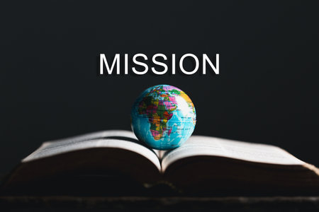 Globe with Holy Bible for mission, Mission christian idea. bible and book on wooden table, Christian background for great commissionの写真素材