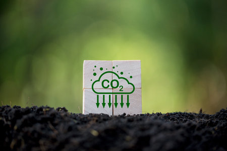 Reduce CO2 emissions to limit climate change and global warming. Low greenhouse gas levels, decarbonize, net zero carbon dioxide footprint. green nature background. Business carbon credit concept.の写真素材