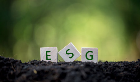ESG concept of environmental, social and governance. words ESG on a wood cube is an idea for business sustainable organizational development. âaccount the environment, society and corporate governanceの写真素材
