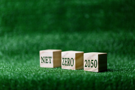 Reduce CO2 emissions to limit climate change and global warming. Low greenhouse gas levels, decarbonize, net zero carbon dioxide footprint. green nature background. Business carbon credit concept.の写真素材