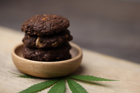 Cannabis or Marijuana cookies is Delicious homemade cookies with CBD. And leaf garnish. Medicinal Edibles. Treatment of medical marijuana. The Cannabis is green herbal medicine is healthy delicious.の写真素材