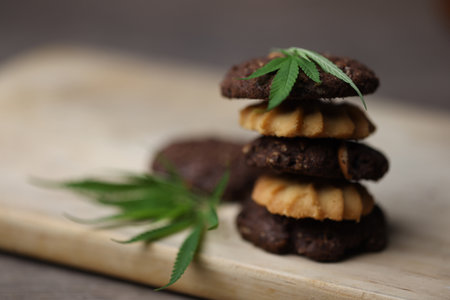 Cannabis or Marijuana cookies is Delicious homemade cookies with CBD. And leaf garnish. Medicinal Edibles. Treatment of medical marijuana. The Cannabis is green herbal medicine is healthy delicious.の写真素材
