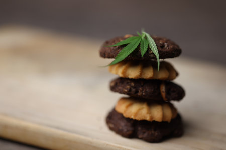 Cannabis or Marijuana cookies is Delicious homemade cookies with CBD. And leaf garnish. Medicinal Edibles. Treatment of medical marijuana. The Cannabis is green herbal medicine is healthy delicious.の写真素材