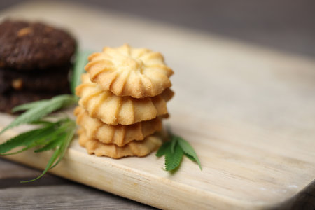 Cannabis or Marijuana cookies is Delicious homemade cookies with CBD. And leaf garnish. Medicinal Edibles. Treatment of medical marijuana. The Cannabis is green herbal medicine is healthy delicious.の写真素材