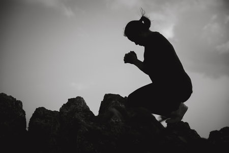 Woman praying to god, posing asian women, girl adult fashionable model, feeling moments, enjoying, happiness on top mountain. Female christian worshipper.の写真素材