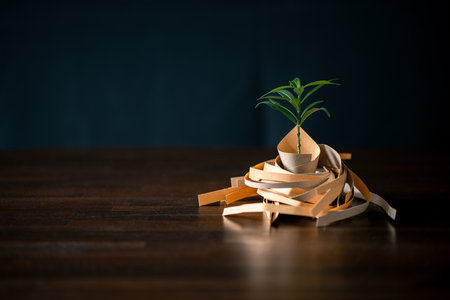 Embrace eco-consciousness of our time with this captivating image showcasing the concept of saving world through recycling paper trees. Join the environmental movement by promoting sustainability.の写真素材