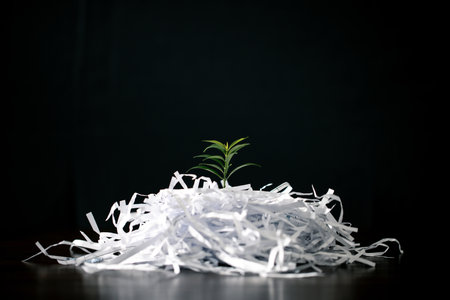 Embrace eco-consciousness of our time with this captivating image showcasing the concept of saving world through recycling paper trees. Join the environmental movement by promoting sustainability.の写真素材