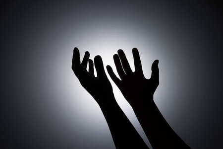 Silhouette photo, A young woman prayed for God's blessings with the power and holiness of God on...