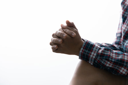 Close up prayer hand pray in church, Pastor pray to God. Christian life crisis prayer to god. Woman Pray for god blessing to wishing have better life. begging for forgiveness and believe in goodness.の写真素材