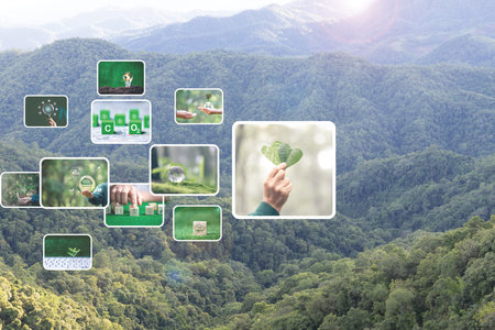Environment World Earth Day.Technology earth global growing tree in human hand on green nature background.Saving environment, save clean planet, ecology concept. Ecology and Sustainable Development.の写真素材