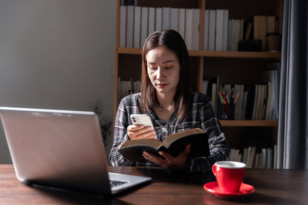 Christian online technology concept. Hands praying of christian with digital computer laptop, Online...