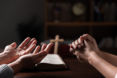 Group of different women praying together, Christians and Bible study concept.の写真素材