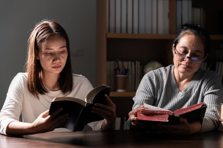Group of different women praying together, Christians and Bible study concept.の写真素材