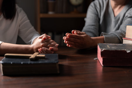 Group of different women praying together, Christians and Bible study concept.の写真素材