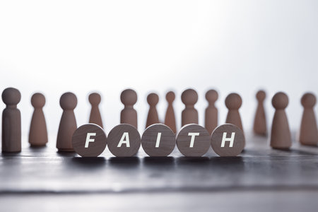 Faith symbol. Turned wooden cube with words Faith. Beautiful white background. Business and Faith concept. Copy spaceの写真素材