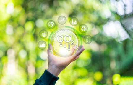 Developing sustainable CO2 concepts and low reduce CO2 emissions and carbon footprint to limit global warming and climate change. sustainable environmental management, Greenhouse from renewable energyの写真素材