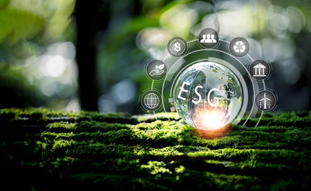 ESG icon concept on green moss for environmental, social, and governance in sustainable and ethical business on the Network connection on a green background. environmental icon, banner and copy spaceの写真素材