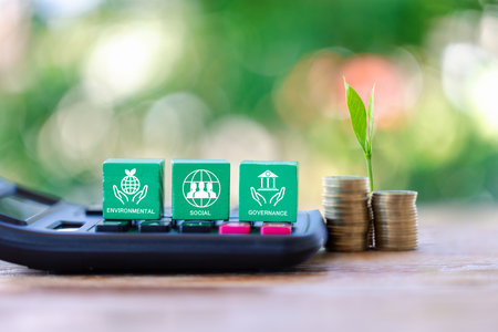 Investing in the environment, society, governance. ESG Investing in the industrial. Green energy invest instead gold coins growing. Concept of Savings in ESG Mutual Funds, Sustainable Business.の写真素材