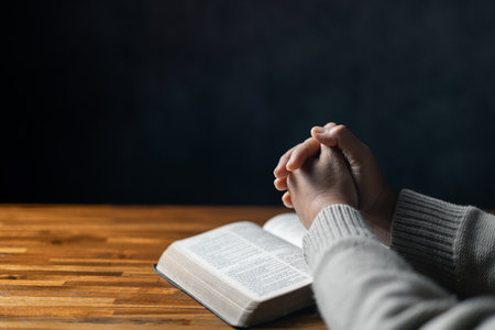 Christian life crisis prayer to god. Woman Pray for god blessing to wishing have a better life. woman hands praying to god with the bible. begging for forgiveness and believe in goodness.の写真素材