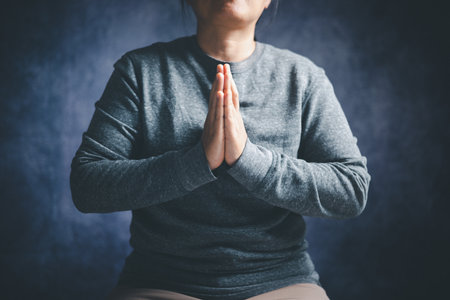 Christian life crisis prayer to god. Woman worship for god blessing to wishing have a better life. woman hands praying to god with the bible. begging for forgiveness and believe in goodness.の写真素材
