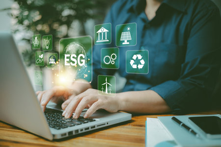ESG environmental social governance investment business concept. Environmental stocks and funds. Businesswoman analyzing stock market and social and environmental investment. business backgroundの写真素材