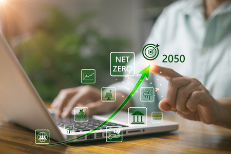 Carbon dioxide emission in industry net zero carbon concept. woman hand with net zero icon. Sustainable energy with co2 affects global warming. Carbon neutrality goal Greenhouse gas emissions 2050の写真素材